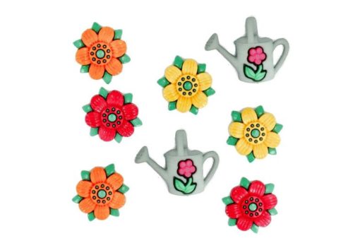 Bright coloured flowers and watering can buttons